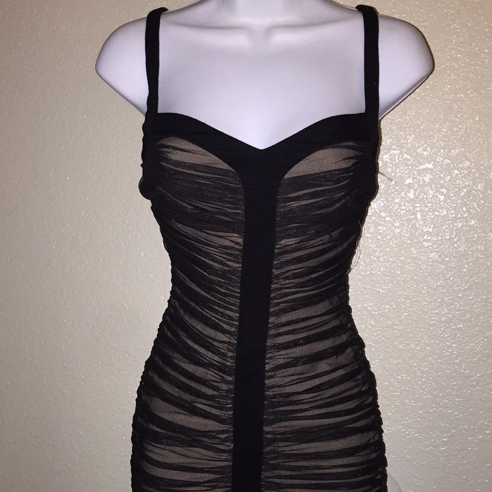 Nude and black dress